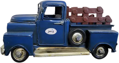 Blue vintage truck with a logo on the door, carrying wooden crates in the bed.